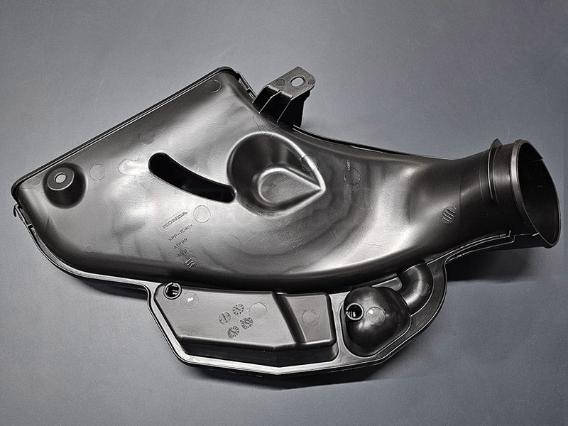 Bottom view of genuine Honda Odyssey air inlet tube factory part 17243-RV0-A00