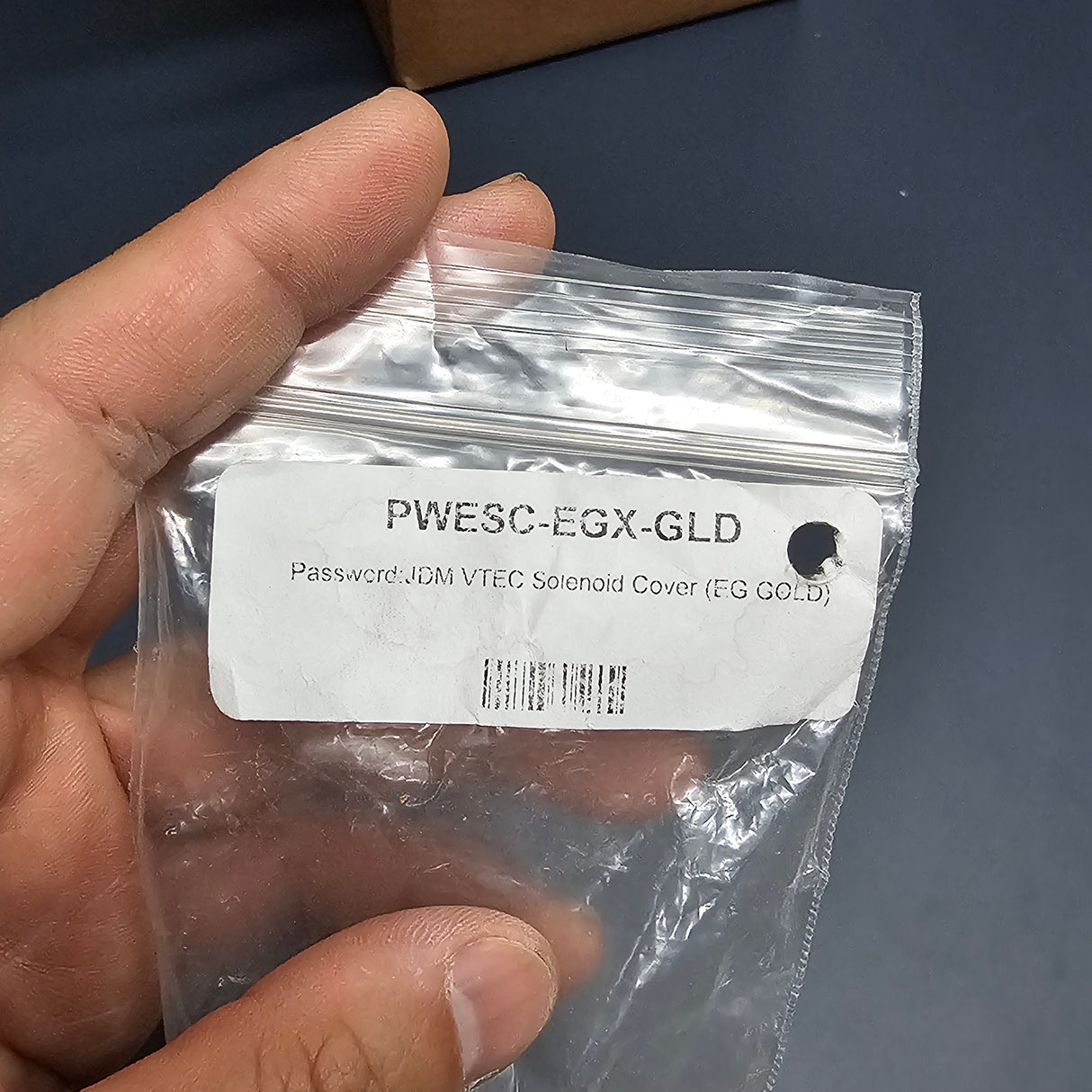 Password JDM VTEC Solenoid Cover Gold Part number view.