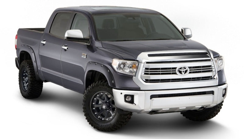 Toyota Tundra fender flare side view with stainless steel rivet style accents