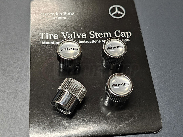 AMG logo on silver badge — chrome Mercedes-Benz valve stem cap