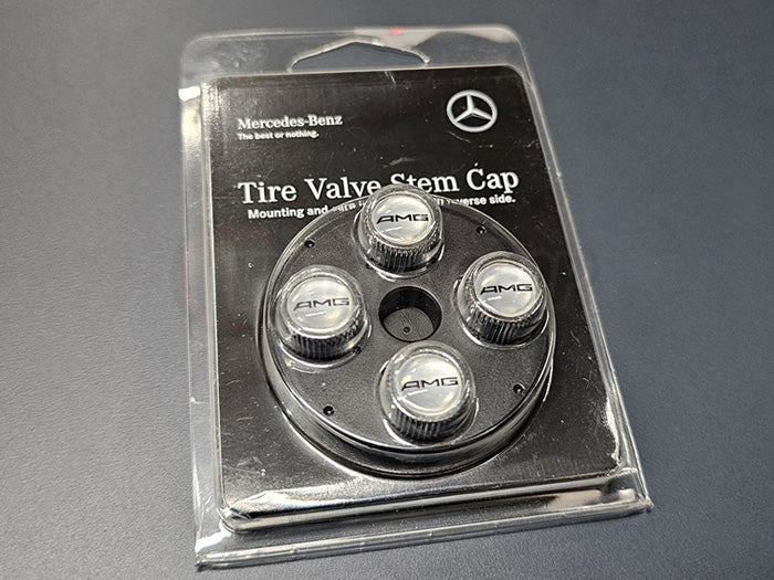 Set of chrome valve stem caps with black AMG logo (Mercedes-Benz)
