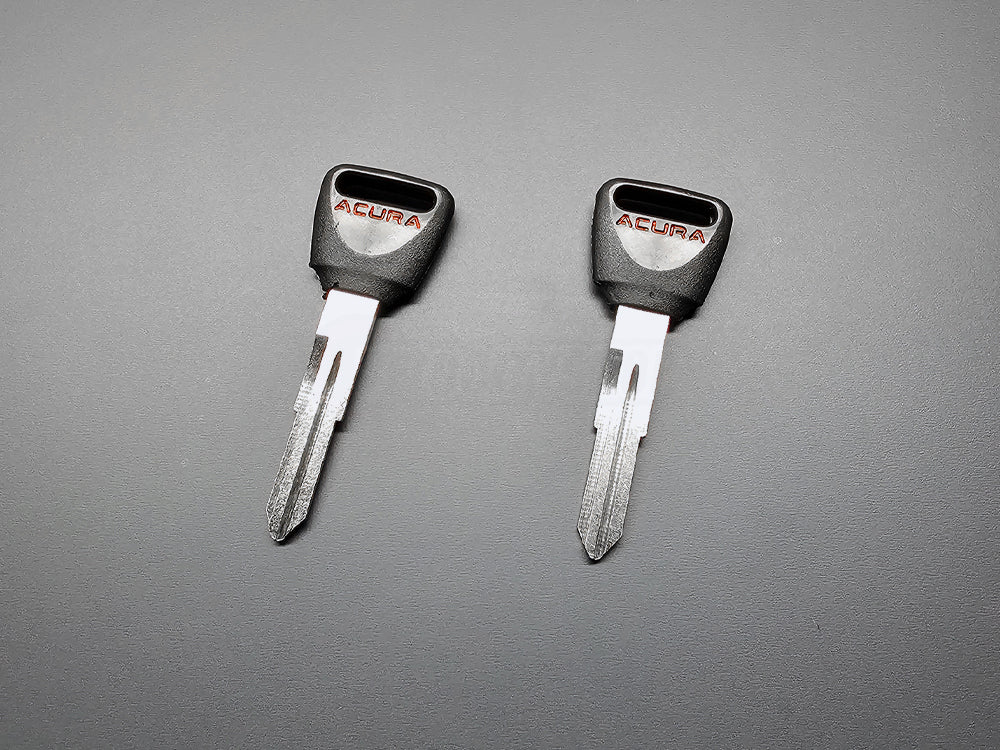 Two-piece Acura Integra blank keys side by side