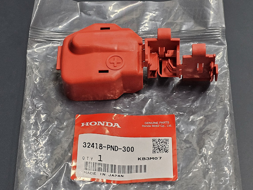 OEM Honda 32418-PND-300 positive battery terminal cover with original packaging