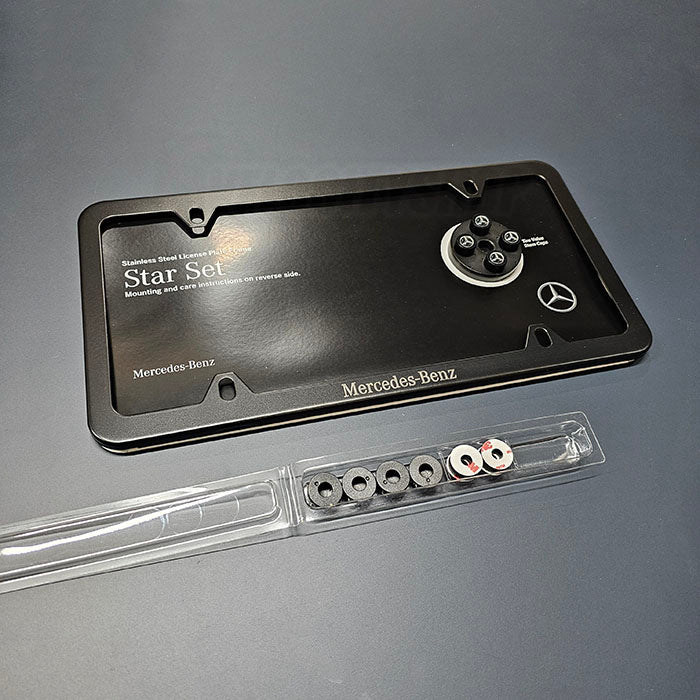 Mercedes-Benz OEM Star Set with black stainless steel license plate frame and logo valve stem caps