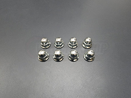 OEM B-Series Valve Cover Nuts 8‑pc kit on engine bay, stainless steel acorn nuts 10 mm