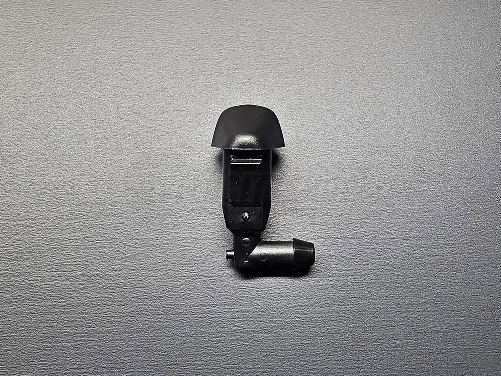 Close-up of OEM Honda passenger-side windshield washer sprayer nozzle for Civic and Del Sol hood