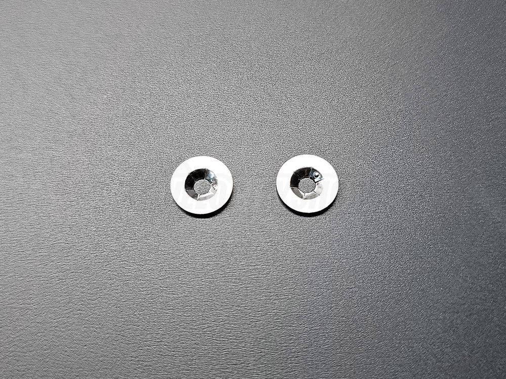 Honda emblem retainer clips showing locking teeth design