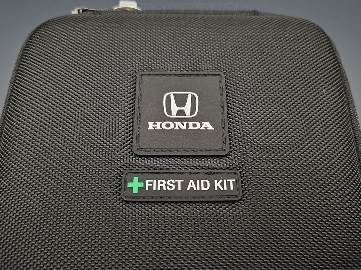 Close up of Honda First Aid Kit case logo and front label