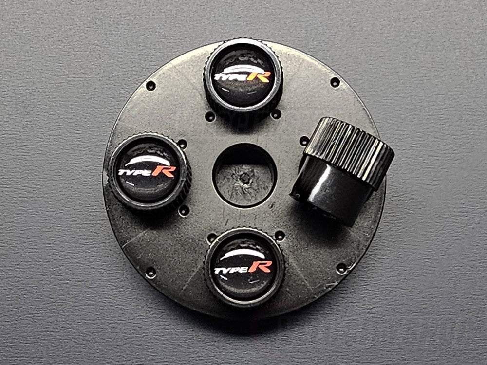 OEM Honda Accessories Type R Black Valve Stem Caps Side View with Grip