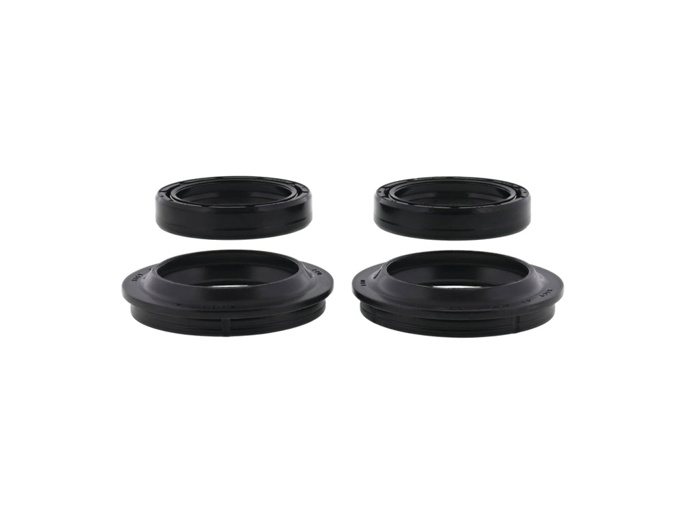 Angled view of two fork oil seals and two dust seals for Honda CRF250F