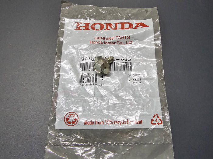 OEM acura RSX fender bolt close up with honda packaging
