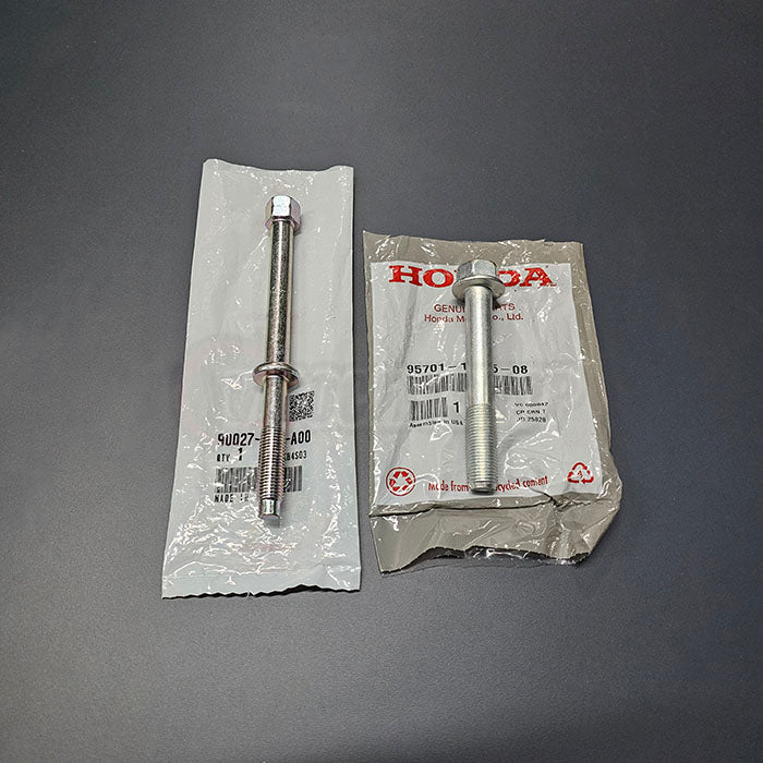 OEM Honda K-Series starter bolts 95701-12085-08 and 90027-PND-A00 side-by-side with Genuine Honda Packaging.