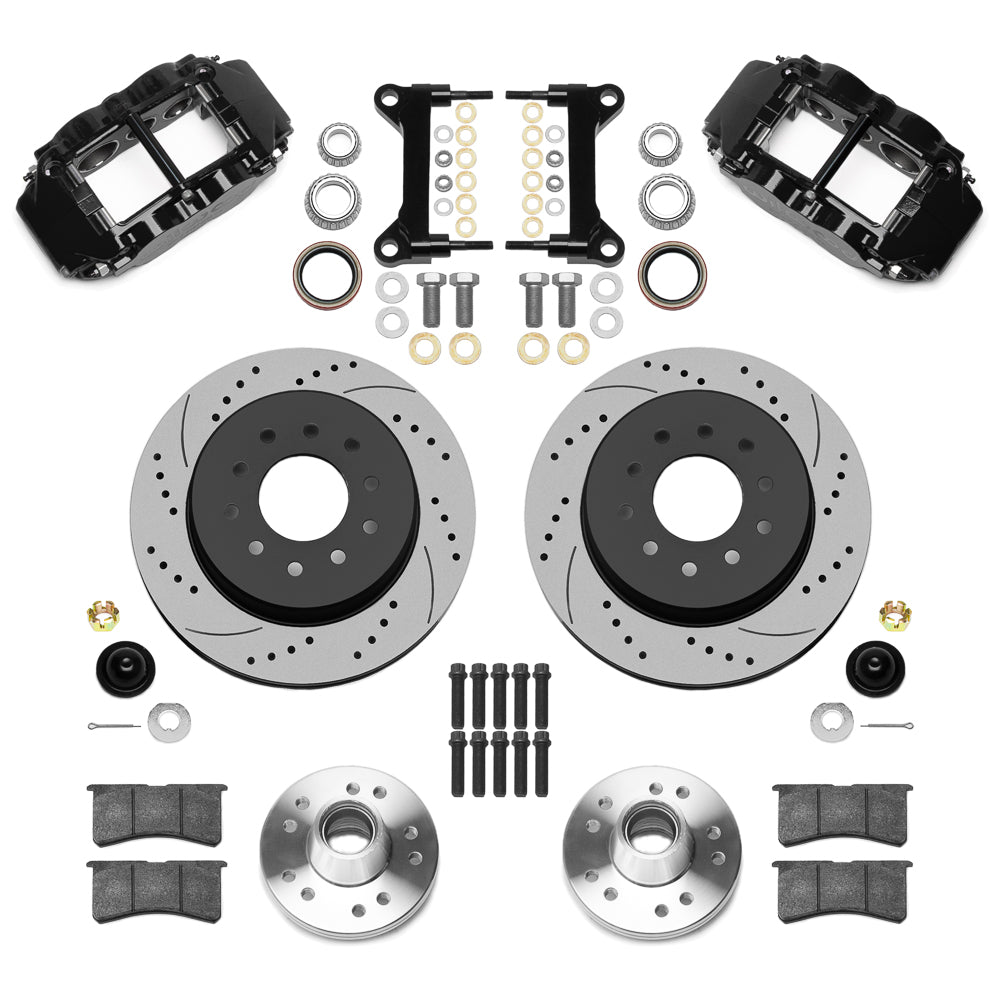 Black Wilwood six-piston calipers with 12.19-inch drilled and slotted rotors