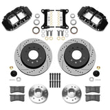 Black Wilwood six-piston calipers with 12.19-inch drilled and slotted rotors