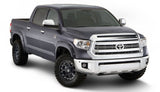 Toyota Tundra fender flare side view with stainless steel rivet style accents