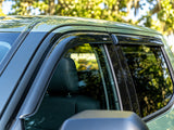 AVS dark-smoke outside-mount Ventvisor window deflectors for 2022–2026 Toyota Tundra CrewMax - Front Side Angle