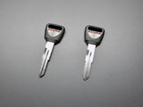 Two-piece Acura Integra blank keys side by side
