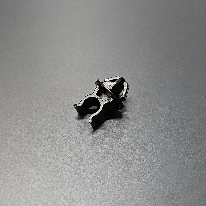 Genuine Honda prop rod retainer showing molded locking barbs and channel