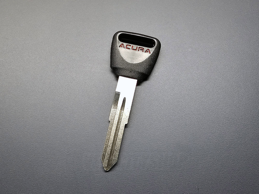 OEM Acura uncut non transponder key blank with Acura logo