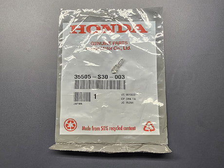 OEM Honda drive selector illumination bulb 35505-S30-003 in factory packaging