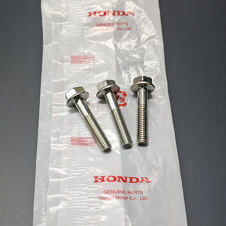 Genuine Honda B16/B18 VTEC spool valve mounting bolts close-up, 3-piece set