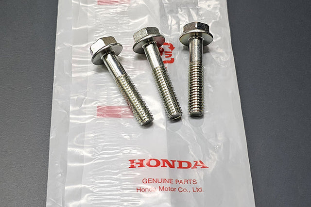 Genuine Honda B16/B18 VTEC spool valve mounting bolts close-up, 3-piece set