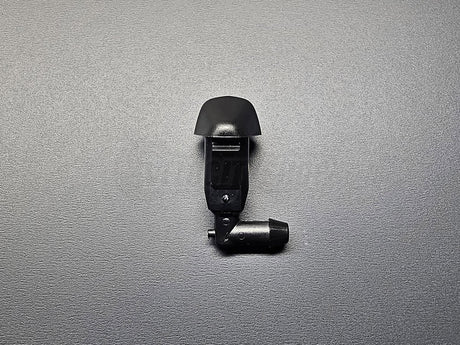 Close-up of OEM Honda passenger-side windshield washer sprayer nozzle for Civic and Del Sol hood