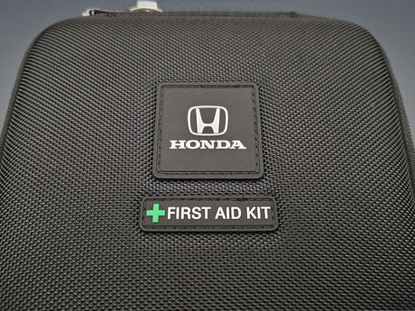 Close up of Honda First Aid Kit case logo and front label