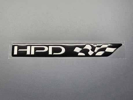 “OEM Honda Performance Development HPD emblem chrome badge for Honda vehicles.”