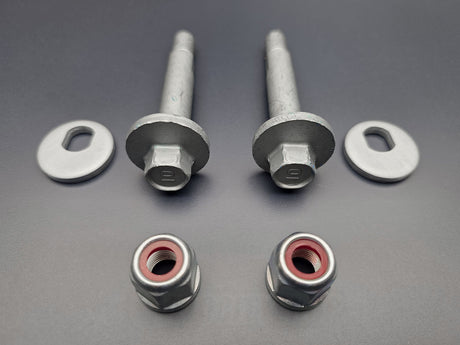 Close up of OEM Honda Acura rear alignment cam bolts washers and nuts for Accord TSX