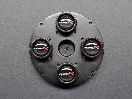 Honda Type R valve stem caps OEM accessory top-down view