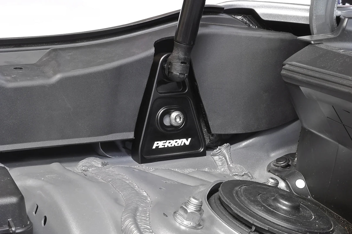 Black PERRIN high-lift hood brackets for 2015–2026 Subaru WRX and 2015–2021 STI installed view
