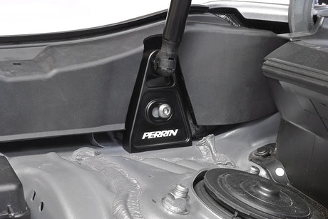 Black PERRIN high-lift hood brackets for 2015–2026 Subaru WRX and 2015–2021 STI installed view