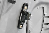 Black PERRIN high-lift hood brackets for 2015–2026 Subaru WRX and 2015–2021 STI installed view, hood side