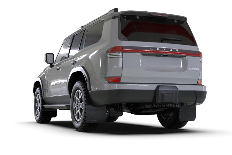 Rear-right view of Grey Lexus GX 550 Luxury equipped with Rally Armor UR Mud Flaps – shows full coverage and black finish with silver logo.