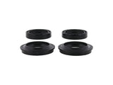 Angled view of two fork oil seals and two dust seals for Honda CRF250F