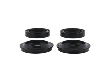 Angled view of two fork oil seals and two dust seals for Honda CRF250F