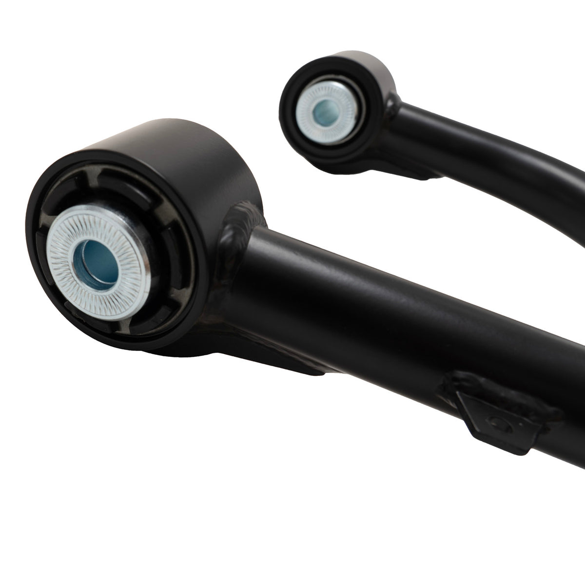 Pair of black Bilstein B8 Pro front upper control arms for 2005–2023 Toyota Tacoma - Bushing View
