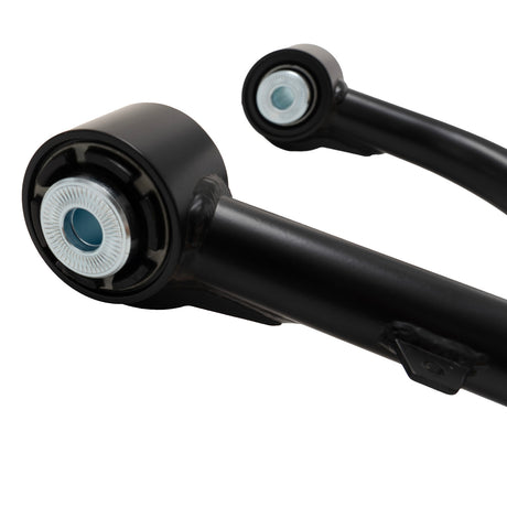 Pair of black Bilstein B8 Pro front upper control arms for 2005–2023 Toyota Tacoma - Bushing View