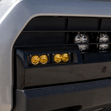 Baja Designs S2 Sport Baja Amber lights installed in the factory fog pocket of a 2025–2026 Toyota 4Runner