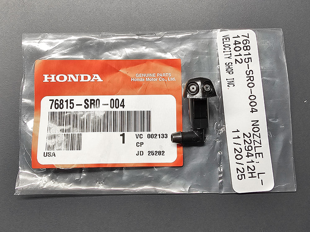Honda OEM Civic EG driver-side washer sprayer nozzle on factory Honda packaging.
