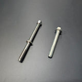 OEM Honda K-Series starter bolts 95701-12085-08 and 90027-PND-A00 side-by-side on dark background
